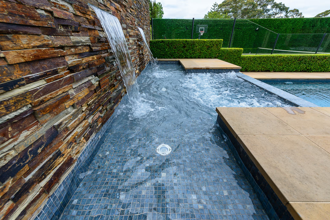 The Ezarri Dolerite Pool Tile Collection