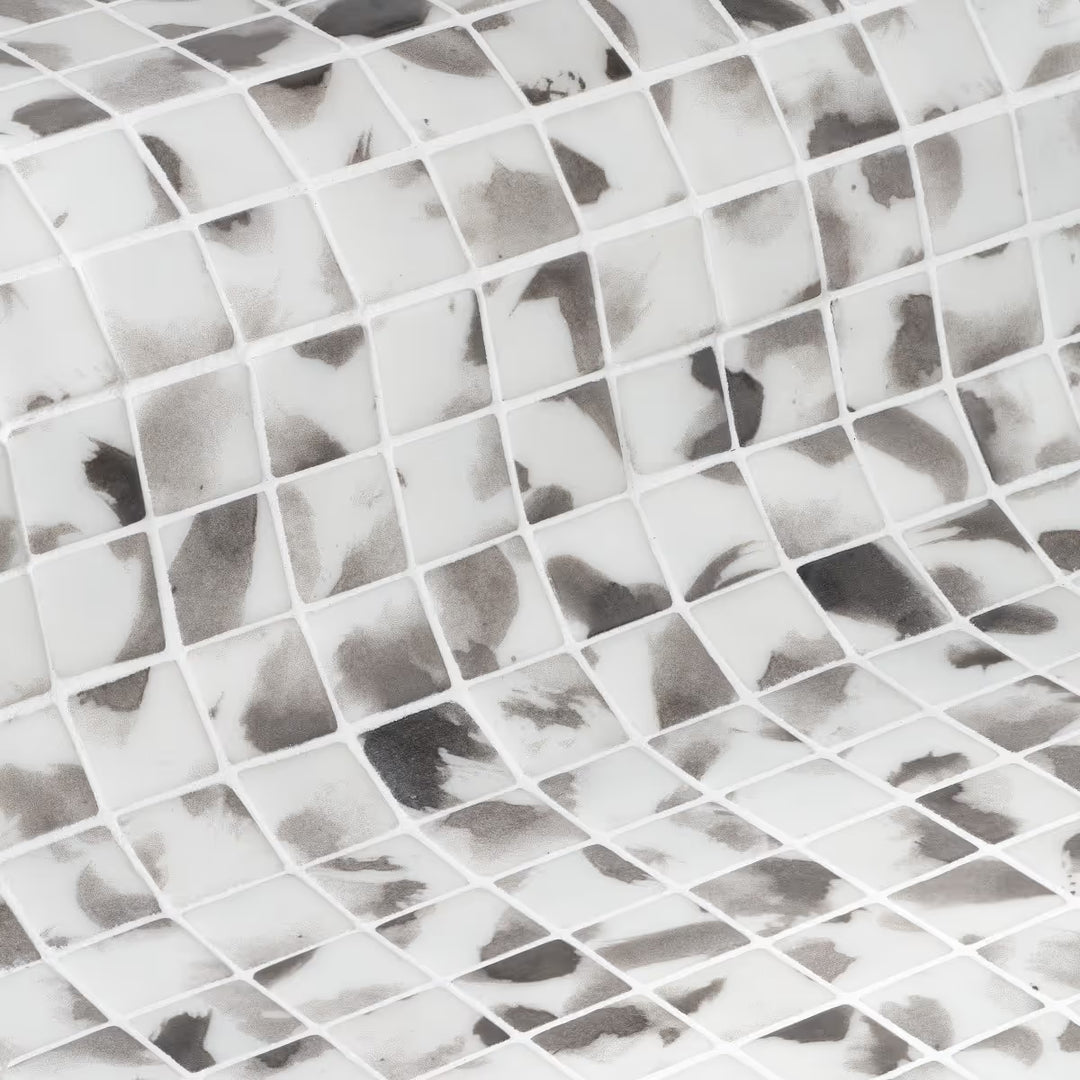 The Ezarri Aquarelle Shades Pool Tile Collection
