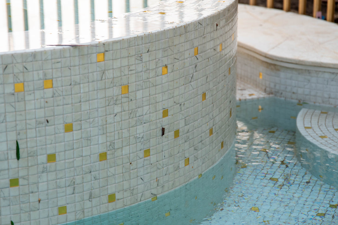 The Ezarri Gold Carrara 25 Pool Tile