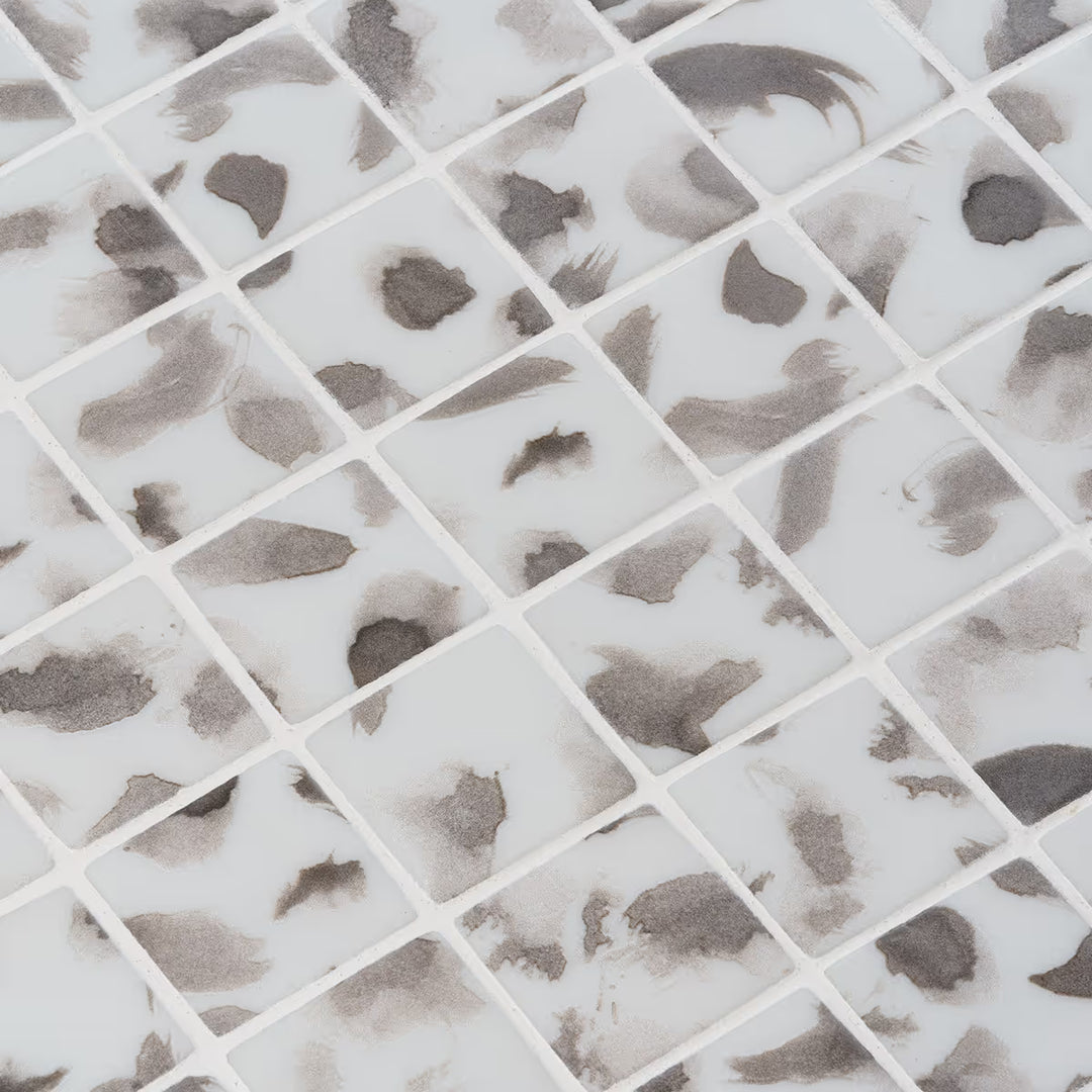 The Ezarri Aquarelle Shades Pool Tile Collection