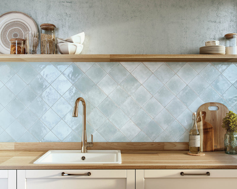 Hero banner showing premium kitchen tiles installation in modern kitchen