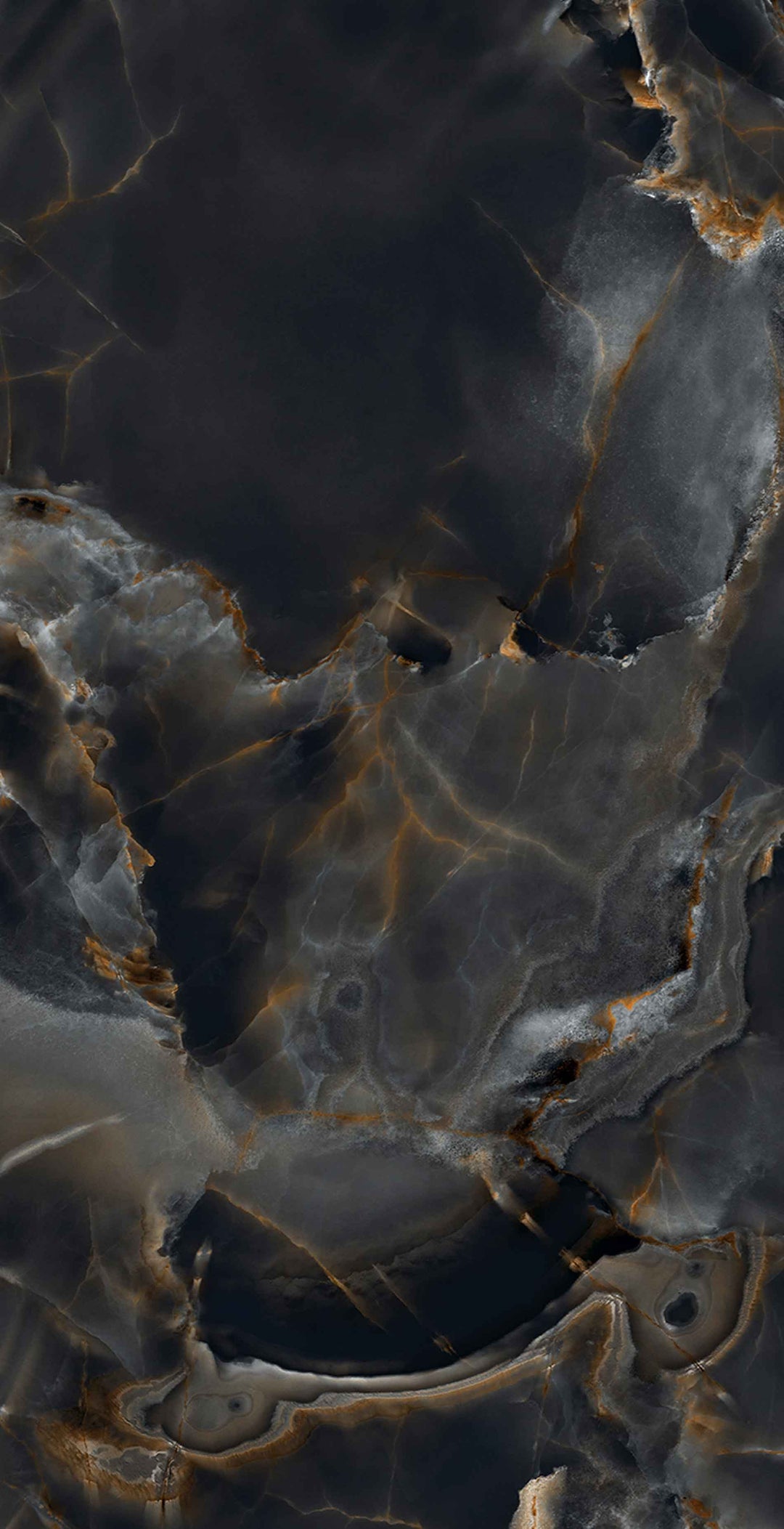 Close-up of a dark marbled surface with brown and black patterns