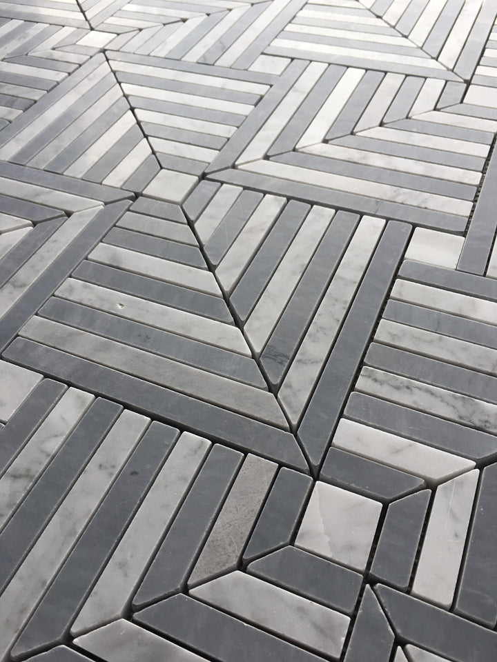 Close-up of grey striped stone composite surface with geometric pattern