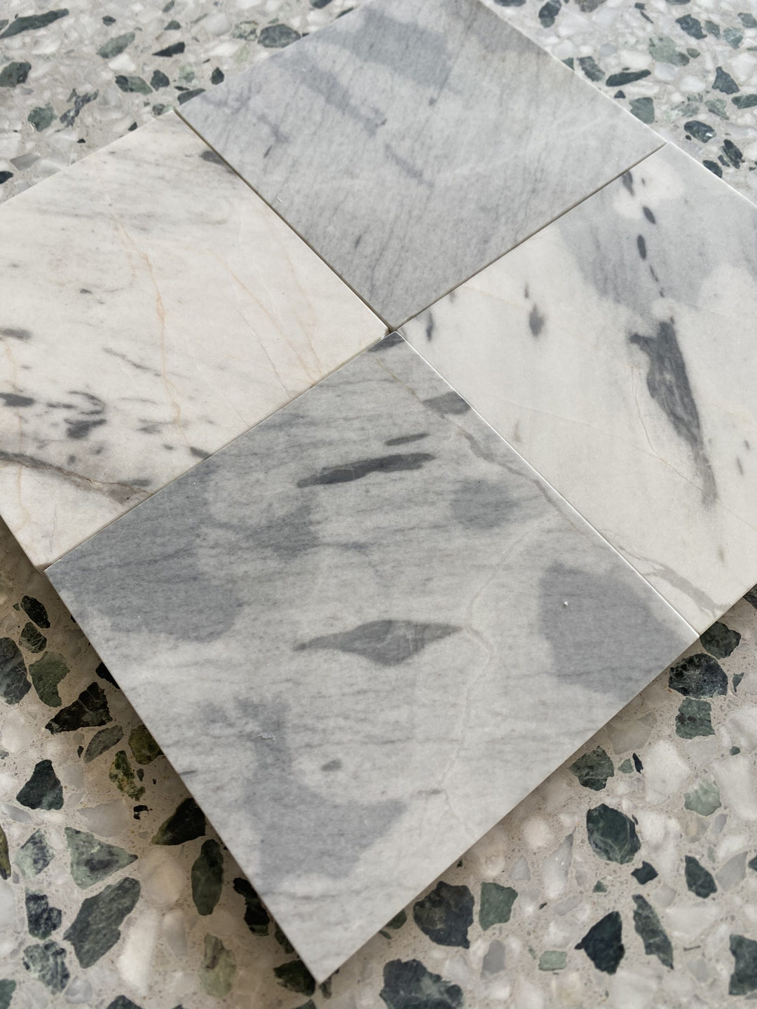 Terrazzo-style Italian porcelain tile with patterned surface and texture