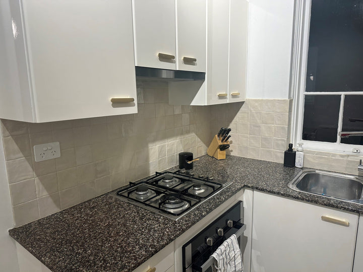 Granite natural stone tiles with speckled appearance, ideal for high-traffic floors