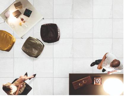 Top-down view of a modern office setup with chairs and a desk.