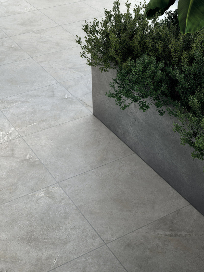 Hero banner showing premium Italian porcelain slabs installed in modern interiors